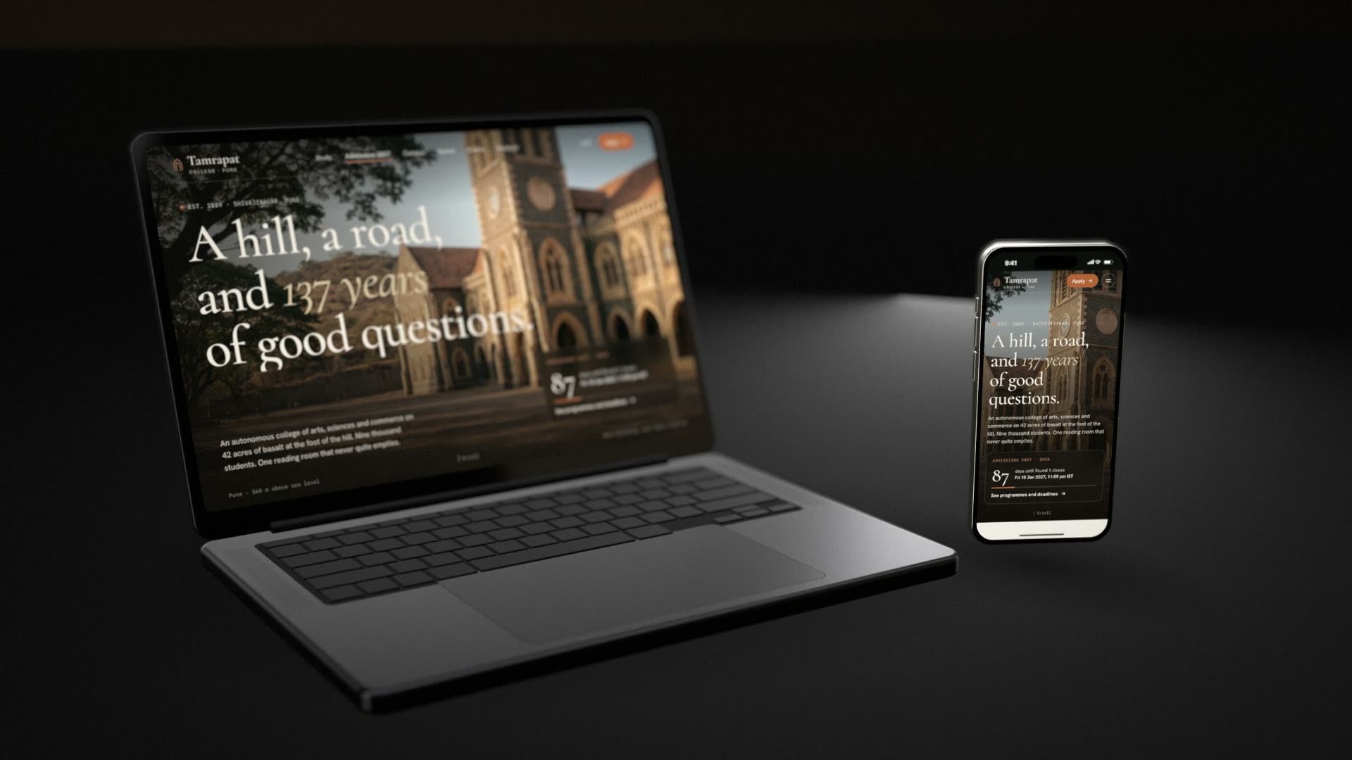 The Tamrapat homepage on a laptop and a phone: the Main Building at sunrise and the line A hill, a road, and 137 years of good questions.